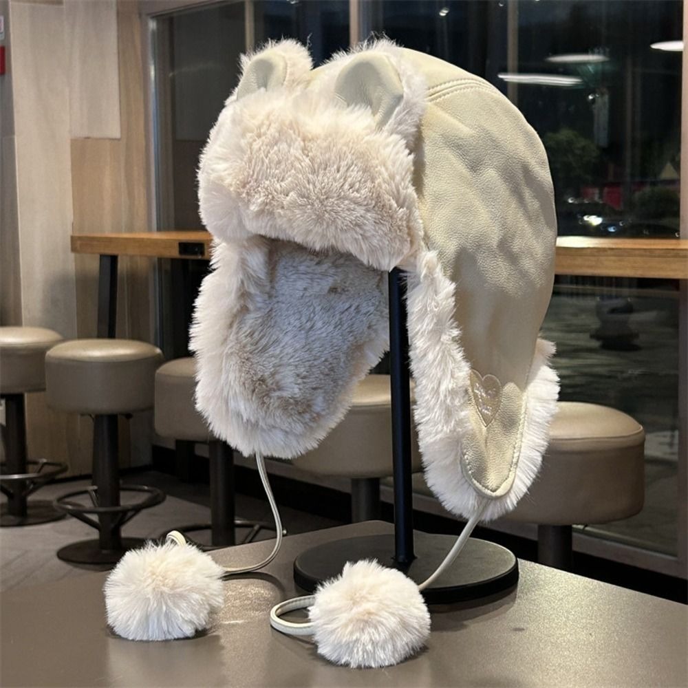قبعة شتوية دافئة من الجلد الصن - مراجعة Winter Trapper Hat وسعره